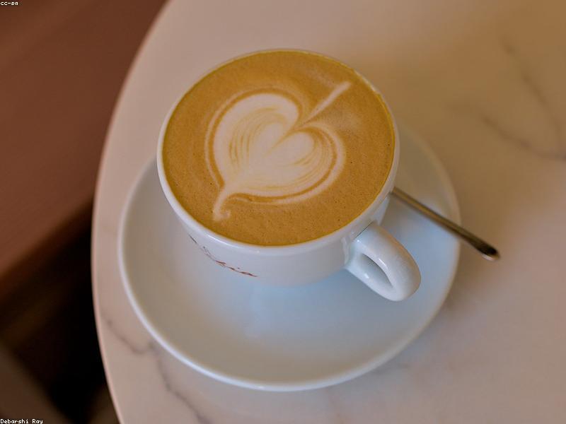 Barista pouring latte art